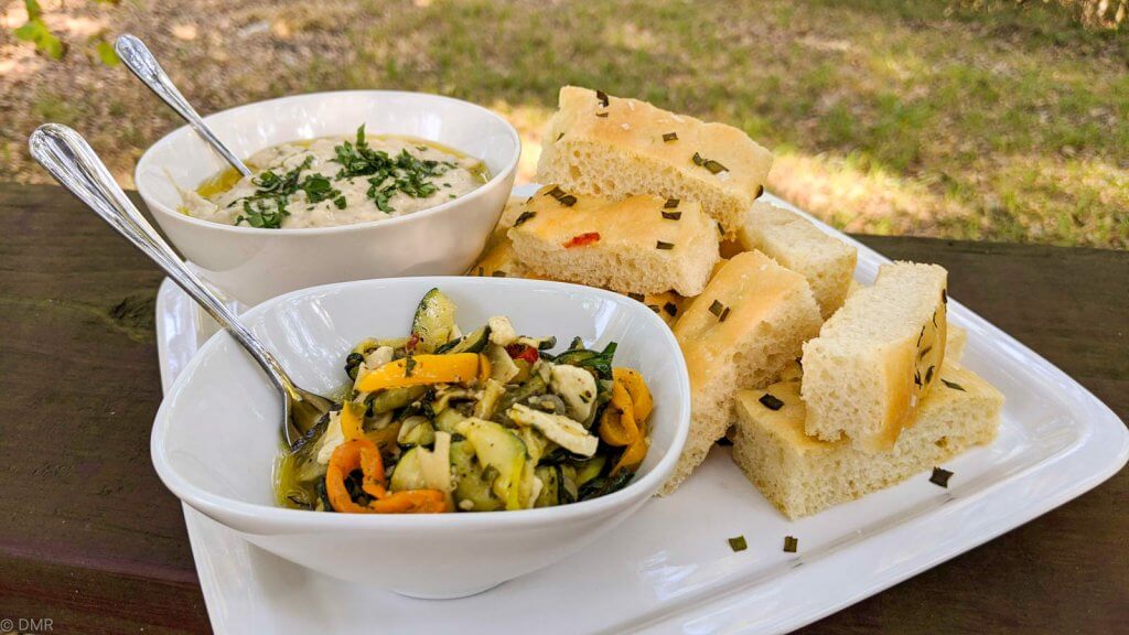 marinated zucchini on plate with focaccia