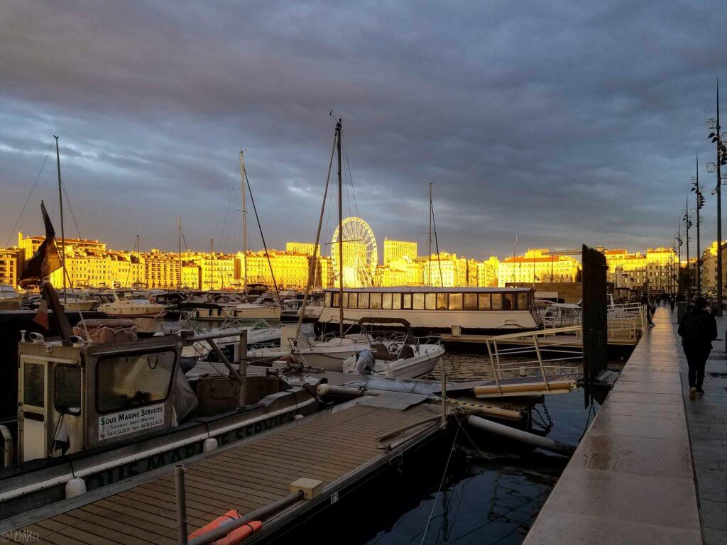 France Marseille golden sunset ferris wheel Vieux Port