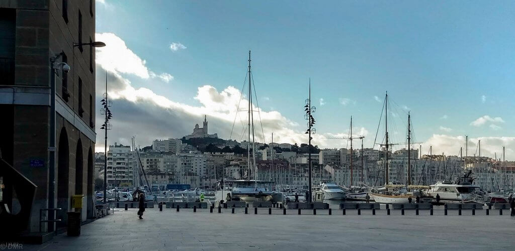 France Marseille Vieux Port with boats and basilica hilltop