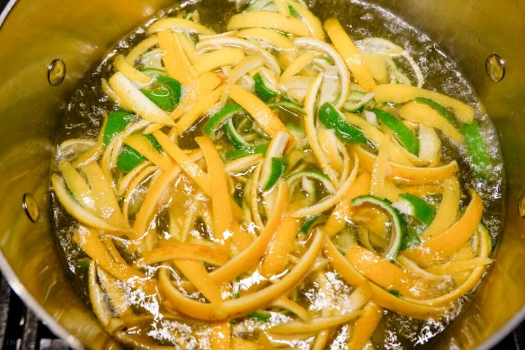 citrus peel in pot of sugar syrup