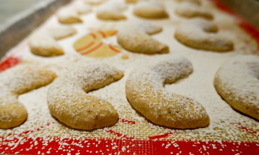 Vanillekipferl German crescent cookies on baking tray